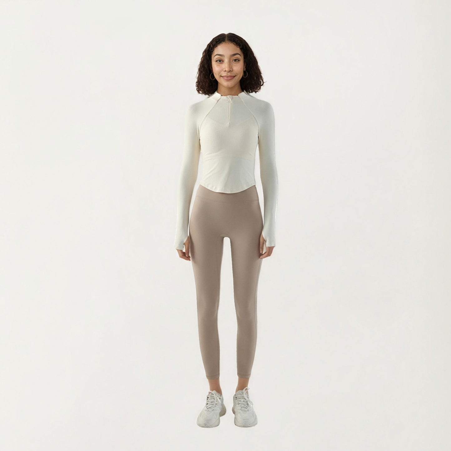 Long Sleeve Ribbed Knit Half Zip Top with Curved Hem and Fitted Silhouette