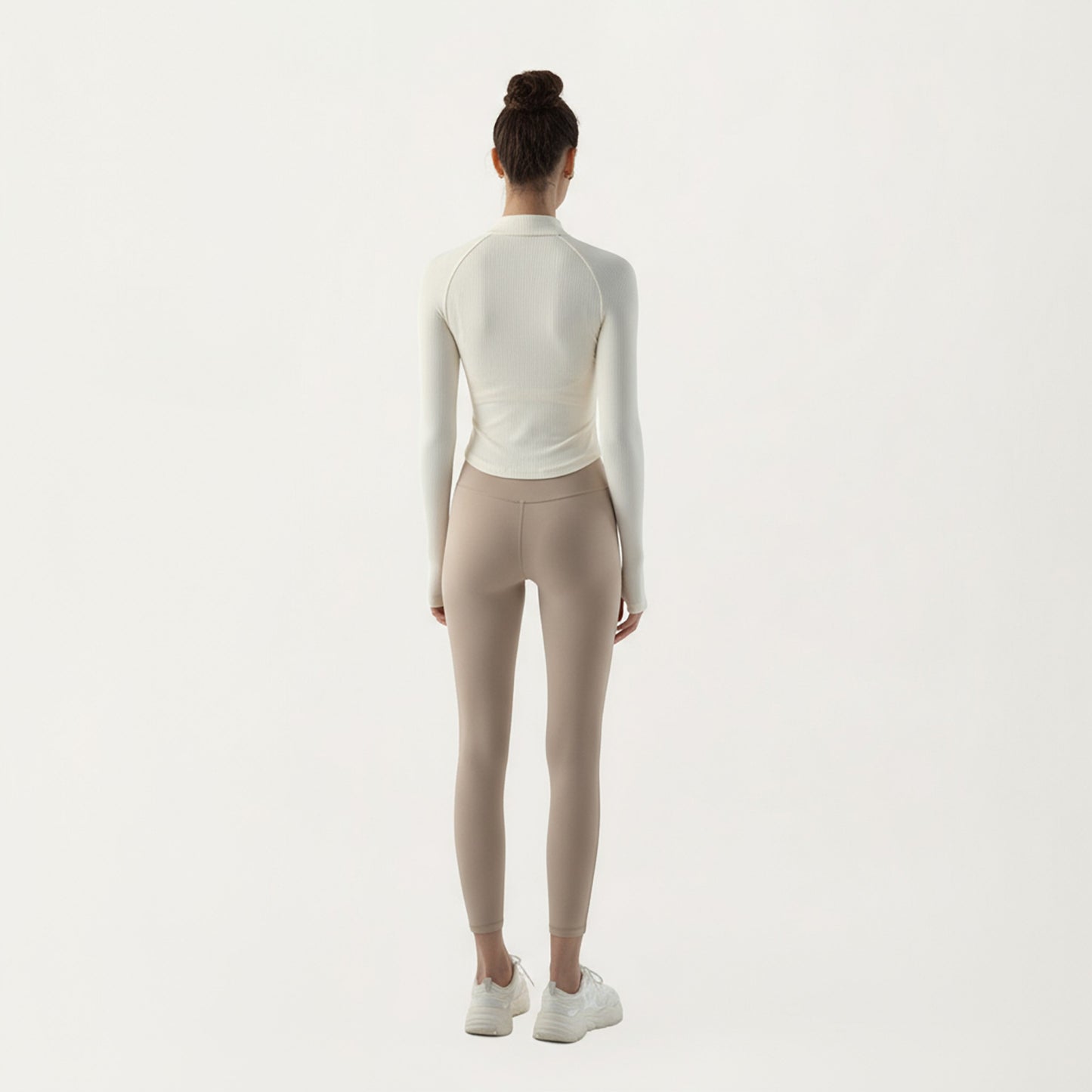 Long Sleeve Ribbed Knit Half Zip Top with Curved Hem and Fitted Silhouette