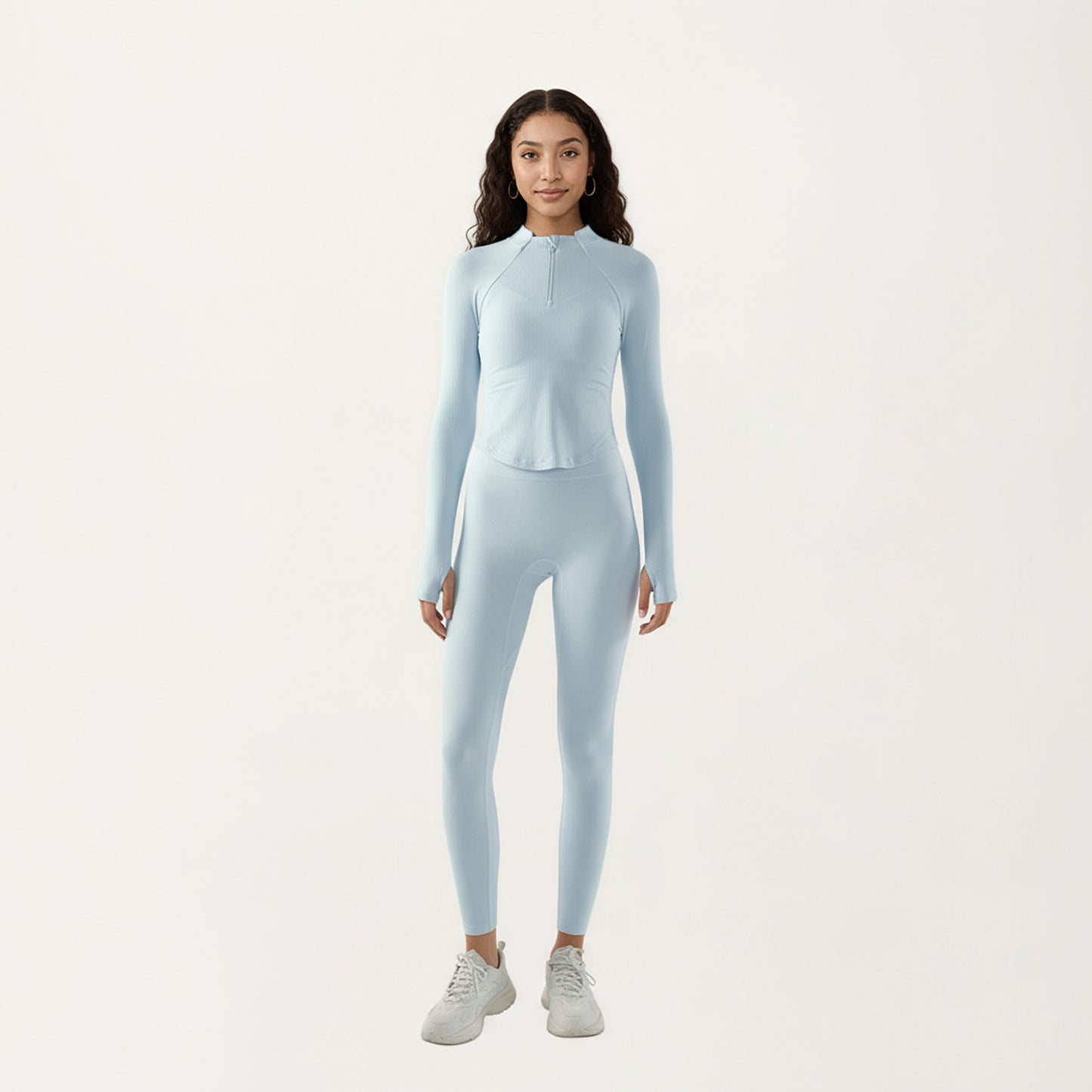 Long Sleeve Ribbed Knit Half Zip Top with Curved Hem and Fitted Silhouette