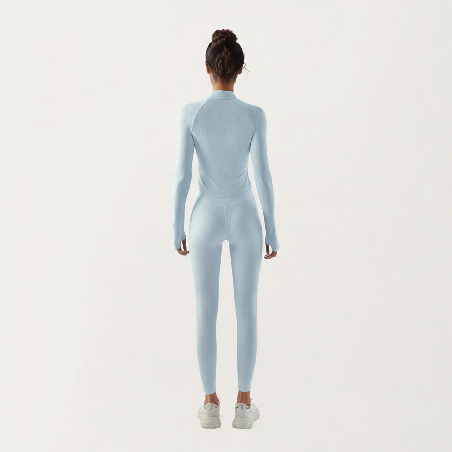 Long Sleeve Ribbed Knit Half Zip Top with Curved Hem and Fitted Silhouette