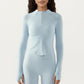 Long Sleeve Ribbed Knit Half Zip Top with Curved Hem and Fitted Silhouette