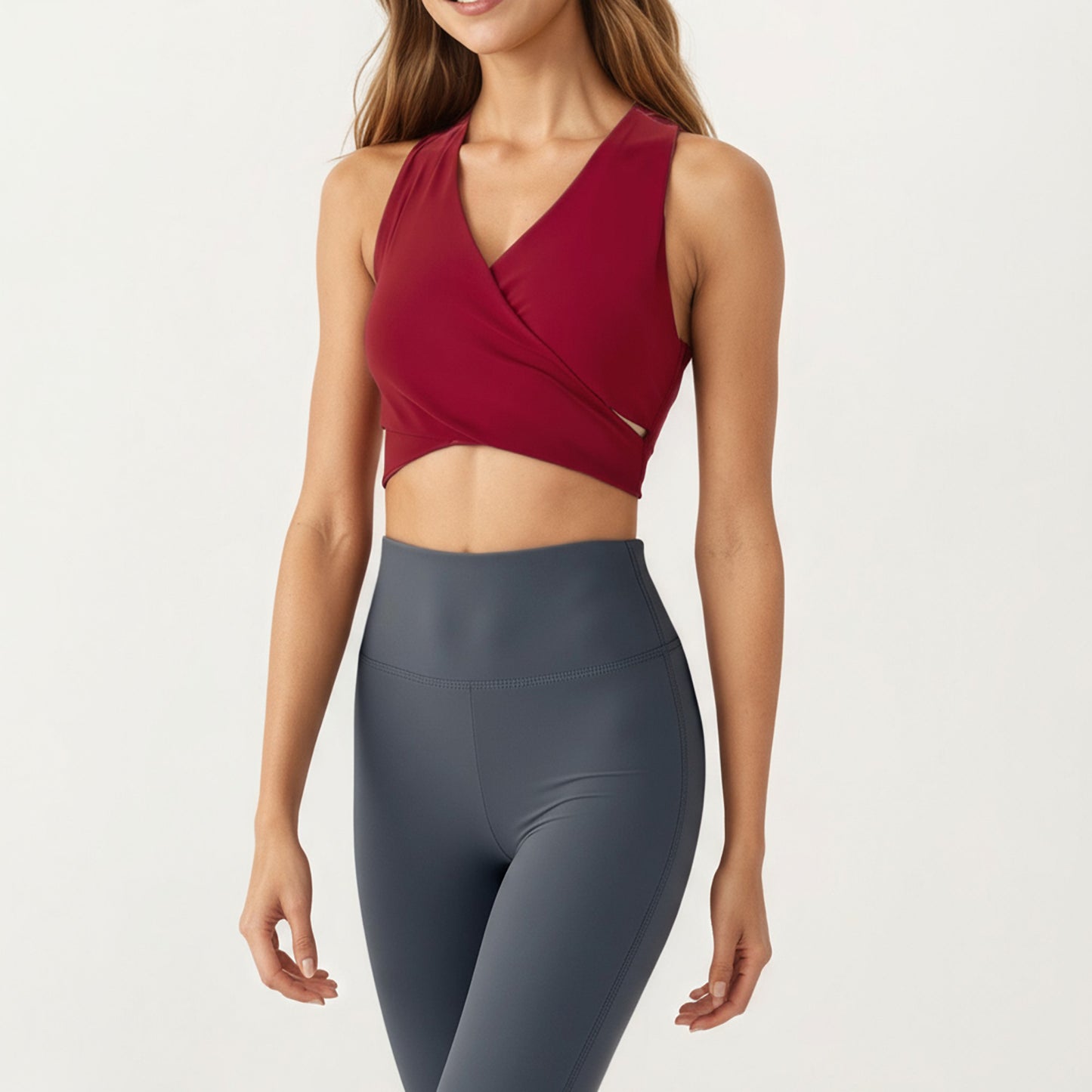 Sleeveless Wrap Front Crop Top with Deep V-Neckline and Twisted Hem Detail