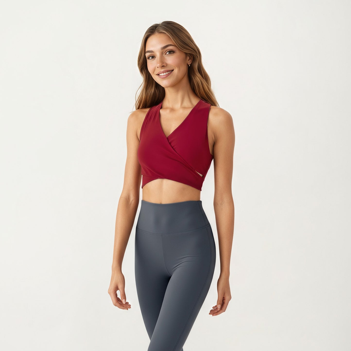 Sleeveless Wrap Front Crop Top with Deep V-Neckline and Twisted Hem Detail