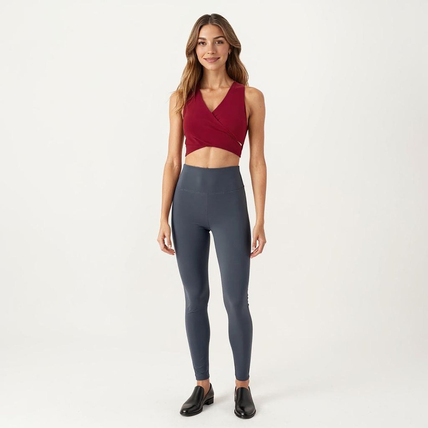 Sleeveless Wrap Front Crop Top with Deep V-Neckline and Twisted Hem Detail