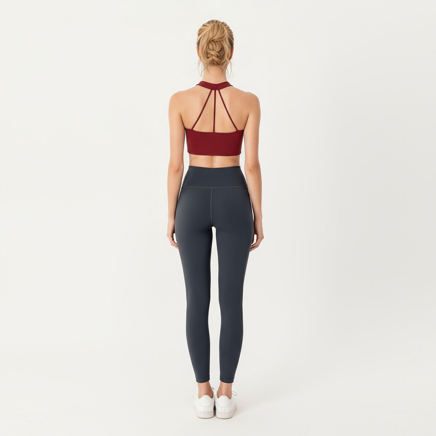 Sleeveless Wrap Front Crop Top with Deep V-Neckline and Twisted Hem Detail