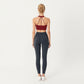 Sleeveless Wrap Front Crop Top with Deep V-Neckline and Twisted Hem Detail