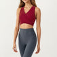 Sleeveless Wrap Front Crop Top with Deep V-Neckline and Twisted Hem Detail