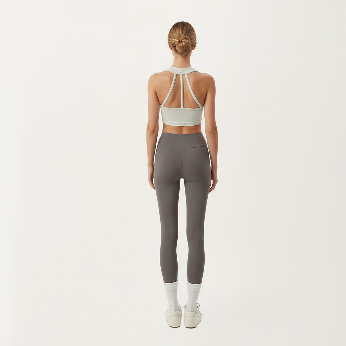 Sleeveless Wrap Front Crop Top with Deep V-Neckline and Twisted Hem Detail