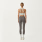 Sleeveless Wrap Front Crop Top with Deep V-Neckline and Twisted Hem Detail
