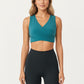 Sleeveless Wrap Front Crop Top with Deep V-Neckline and Twisted Hem Detail