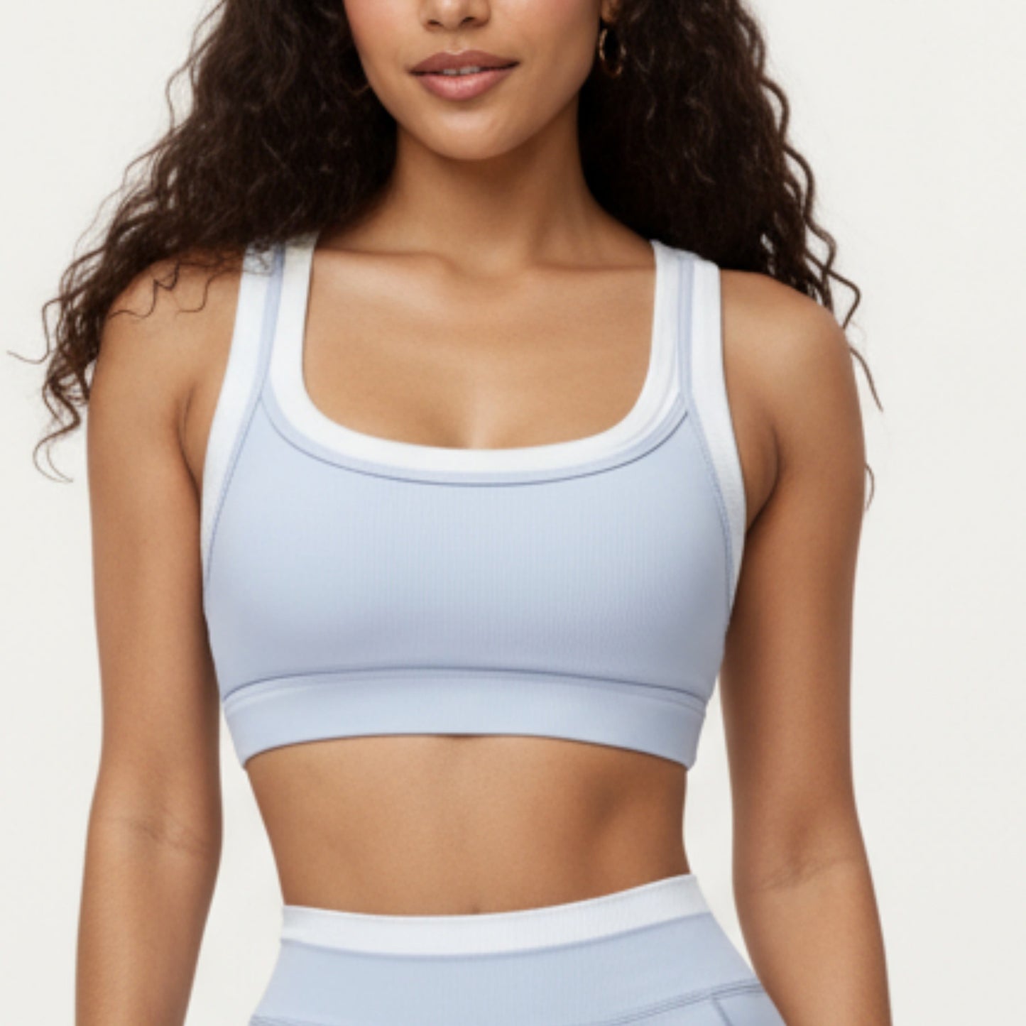 Double Layer Scoop Neck Sports Bra with Smooth Stretch Fabric, Soft Supportive Fit and Wide Straps for Everyday Movement