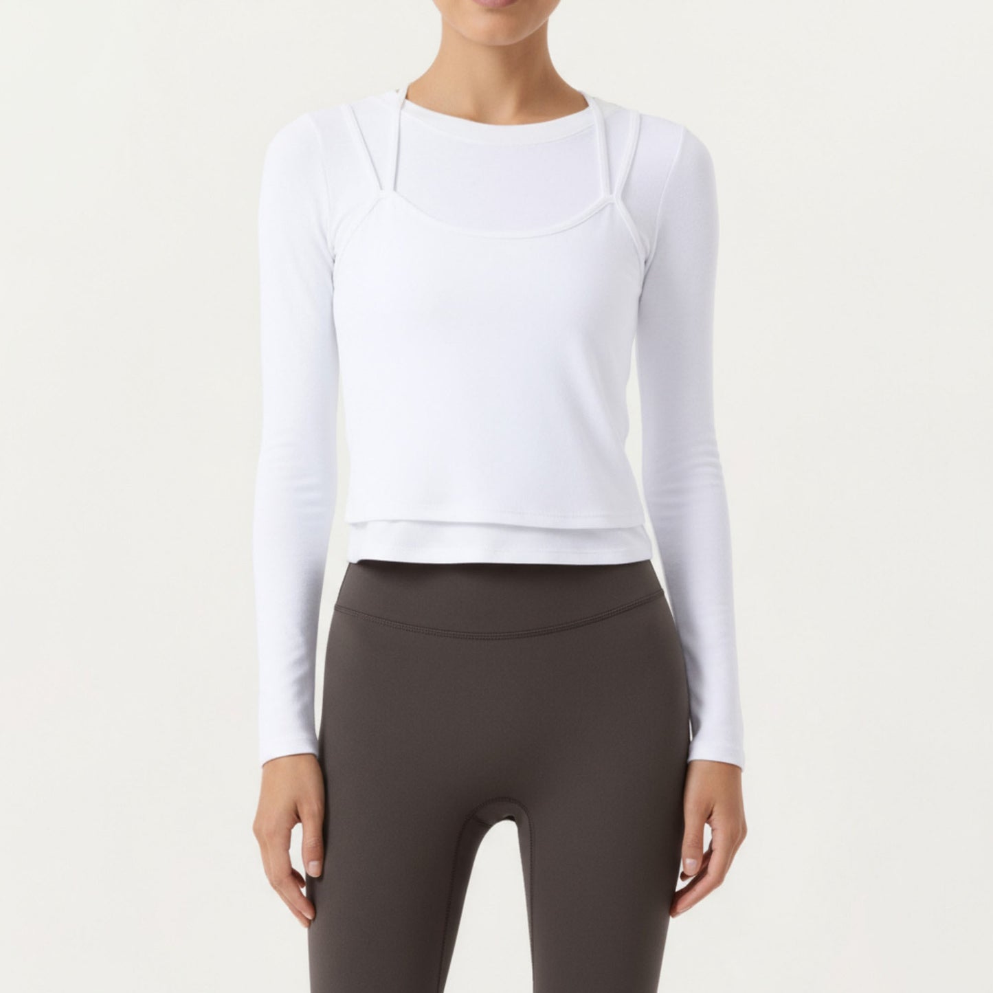 Long Sleeve Active Top with Layered Strap Detail Slim Contoured Fit and Modern Minimal Silhouette