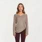 Long Sleeve V Neck Top with Soft Textured Fabric Relaxed Draped Silhouette and Curved Hemline