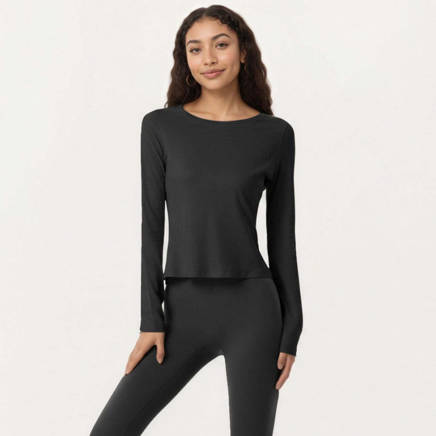 Long Sleeve Active Top with Soft Stretch Fabric Crew Neckline Clean Minimal Silhouette