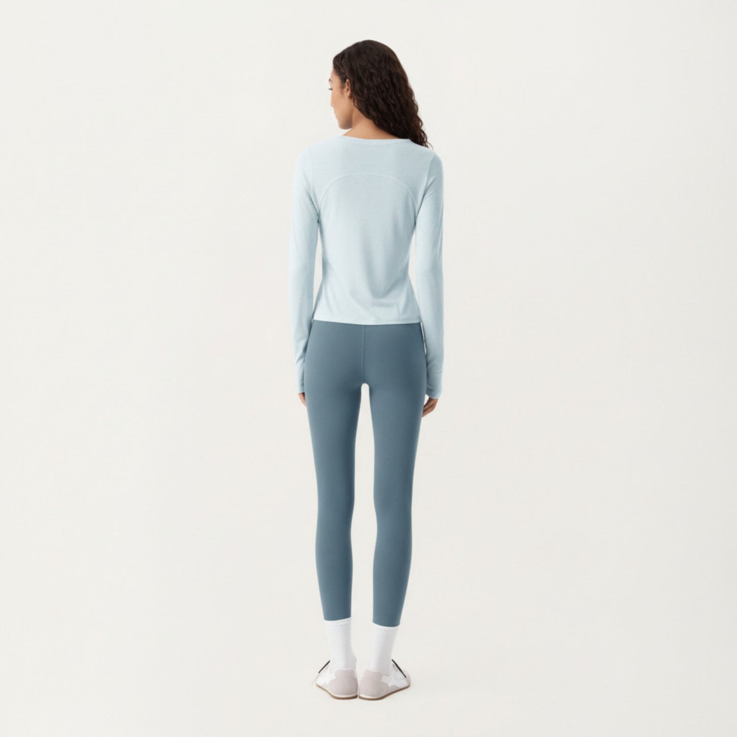 Long Sleeve Active Top with Soft Stretch Fabric Crew Neckline Clean Minimal Silhouette