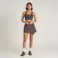 Asymmetrical Hem Active Skort with Built-In Shorts and Snap-Front Overlay for Supportive Movement