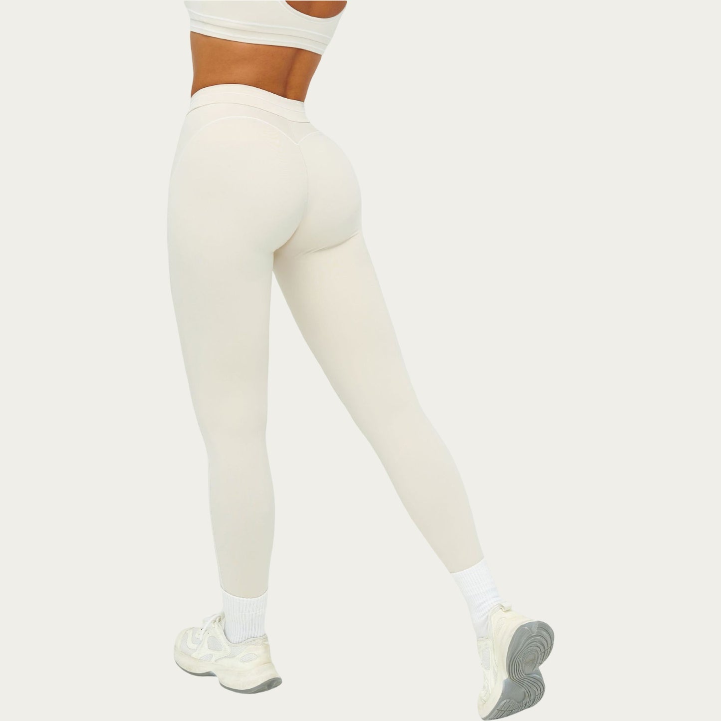 High Waist Sculpting Leggings with Curved Contrast Seam Detailing and Stretch Performance Fabric