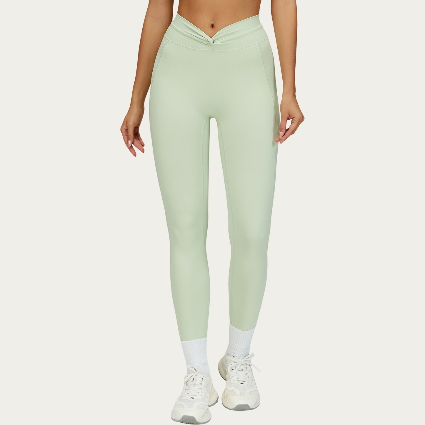 High Waist Sculpting Leggings with Twist Front Waistband and Smooth Stretch Fabric