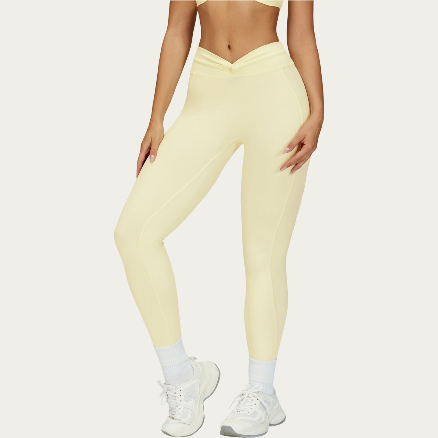 High Waist Sculpting Leggings with Twist Front Waistband and Smooth Stretch Fabric