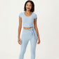 Short Sleeve Ribbed Active Crop Top with Scoop Neck and Back Strap Detail