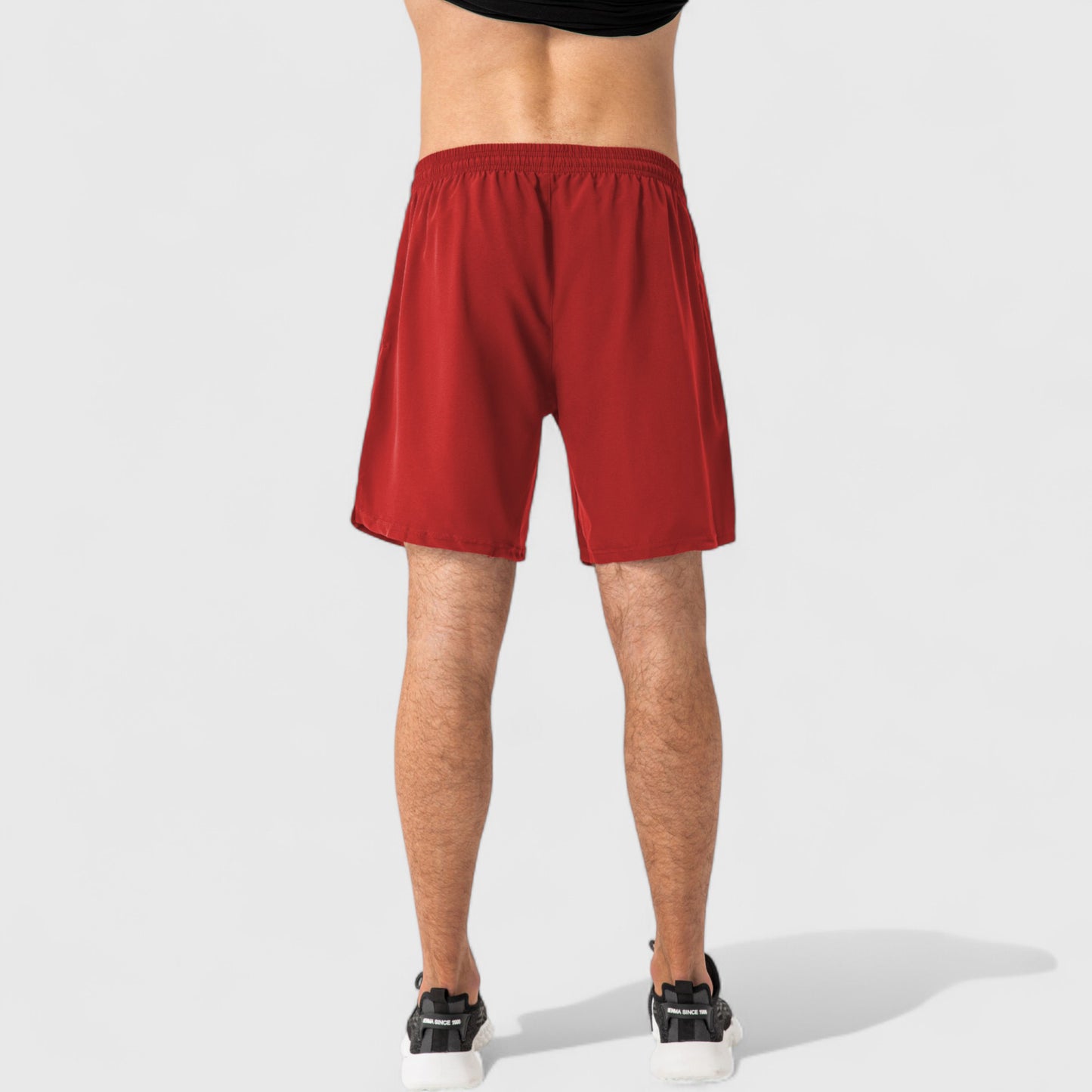 Men's Elastic Waist Athletic Shorts with Above-Knee Length and Relaxed Fit Design