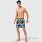 Men's Tropical Print Swim Trunks with Elastic Waistband and Side Pockets