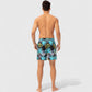 Men's Tropical Print Swim Trunks with Elastic Waistband and Side Pockets