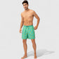 Men's Tropical Print Swim Trunks with Elastic Waistband and Side Pockets