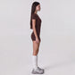 Short Sleeve One Piece Active Romper with Crew Neck Built In Padding Fitted Shorts and Smooth Stretch Fabric