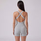 Sleeveless Active Romper with Cross Back Straps Ruched Bust Contour Seams and Fitted Shorts