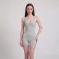 Sleeveless Active Romper with Cross Back Straps Ruched Bust Contour Seams and Fitted Shorts
