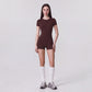 Short Sleeve One Piece Active Romper with Crew Neck Built In Padding Fitted Shorts and Smooth Stretch Fabric