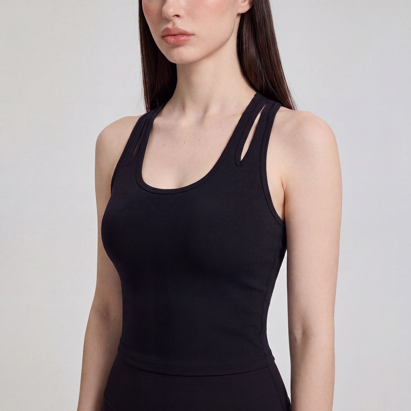 Sleeveless Yoga Tank Top with Built In Padding Scoop Neck Cutout Strap Detail and Fitted Activewear Silhouette