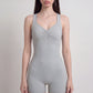 Sleeveless Active Romper with Cross Back Straps Ruched Bust Contour Seams and Fitted Shorts
