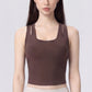 Sleeveless Yoga Tank Top with Built In Padding Scoop Neck Cutout Strap Detail and Fitted Activewear Silhouette