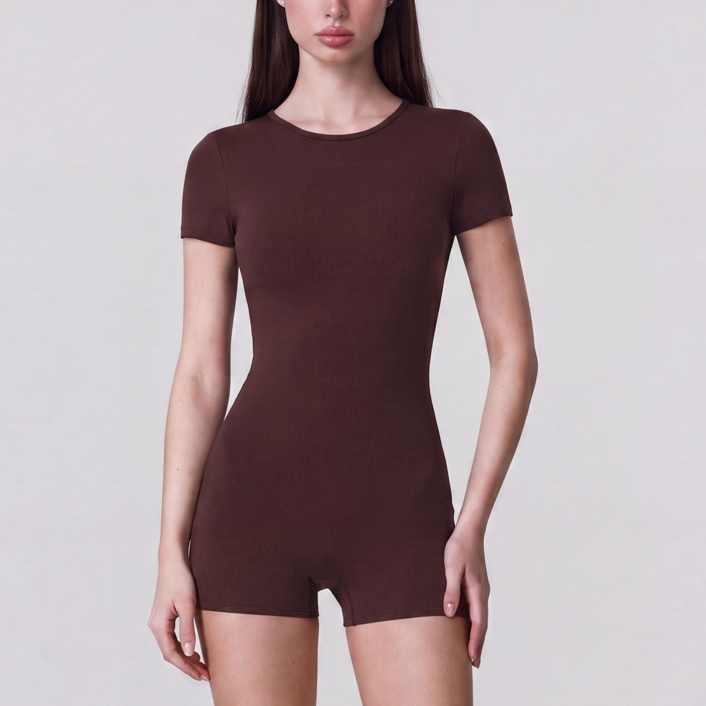 Short Sleeve One Piece Active Romper with Crew Neck Built In Padding Fitted Shorts and Smooth Stretch Fabric