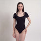 Short Sleeve One Piece Active Bodysuit with Built In Padding Open Back Stretch Fit and Quick Dry Fabric