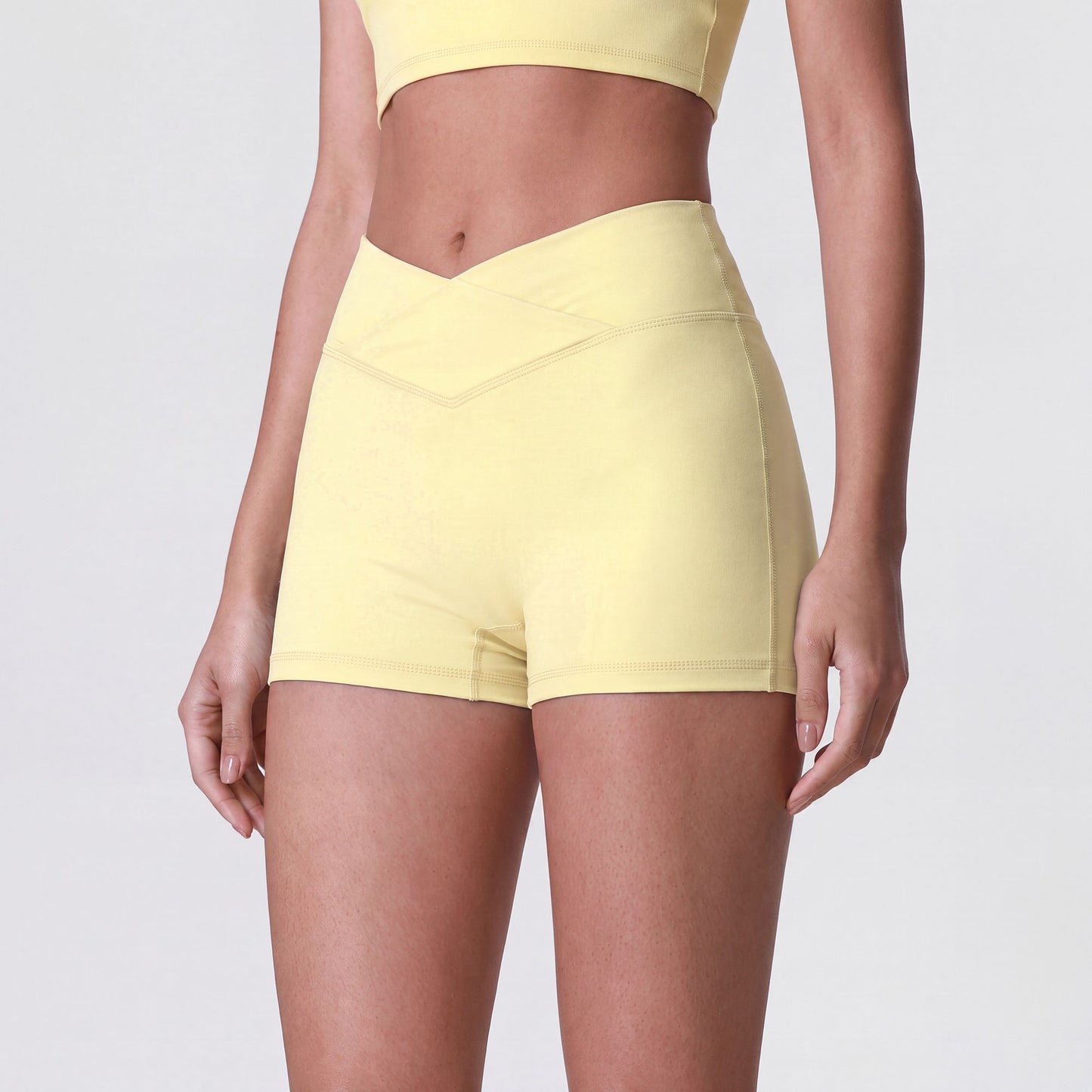 High Waist Crossover Athletic Shorts with Smooth Stretch Fabric and Fitted Biker Short Length
