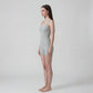 Sleeveless Active Romper with Cross Back Straps Ruched Bust Contour Seams and Fitted Shorts