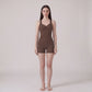 Sleeveless Active Romper with Cross Back Straps Ruched Bust Contour Seams and Fitted Shorts