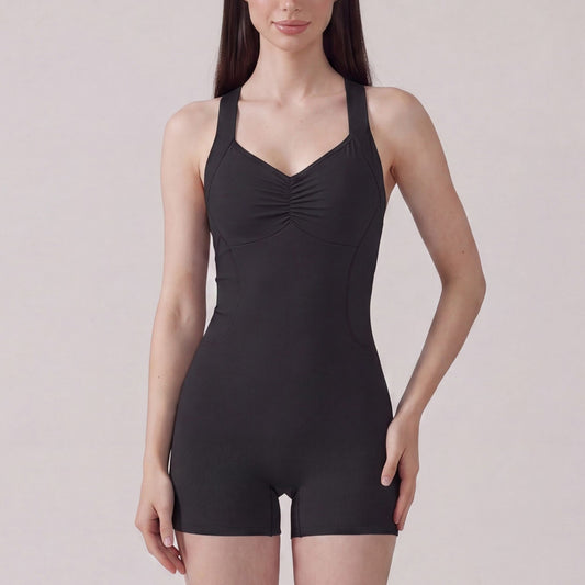Sleeveless Active Romper with Cross Back Straps Ruched Bust Contour Seams and Fitted Shorts