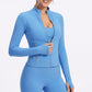 Full Zip Workout Jacket with Thumbholes and Zipper Pockets