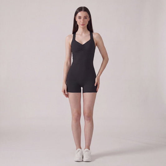 Sleeveless Active Romper with Cross Back Straps Ruched Bust Contour Seams and Fitted Shorts