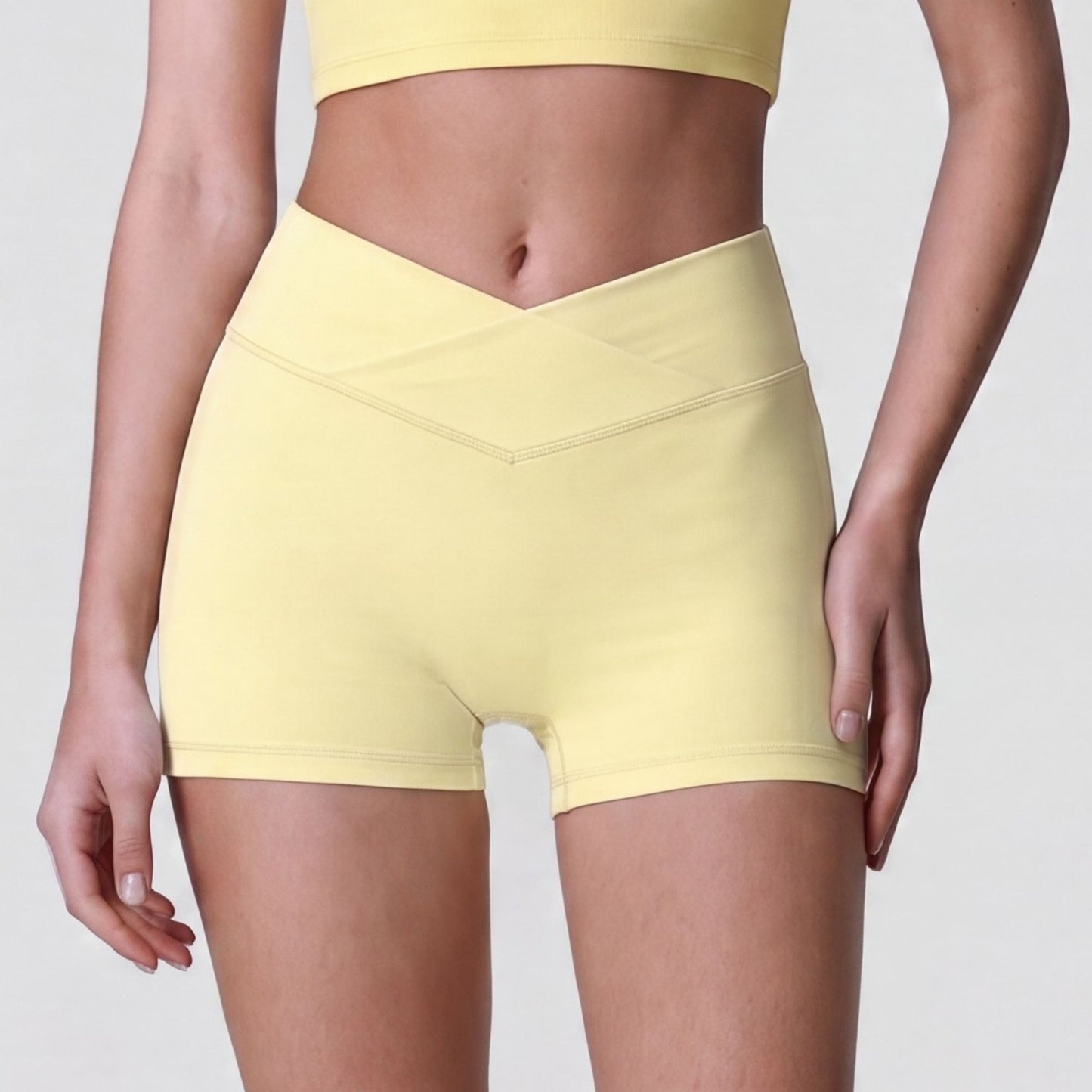 High Waist Crossover Athletic Shorts with Smooth Stretch Fabric and Fitted Biker Short Length