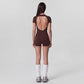 Short Sleeve One Piece Active Romper with Crew Neck Built In Padding Fitted Shorts and Smooth Stretch Fabric