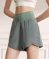 High Rise Running Shorts with Curved Hem and Side Pocket